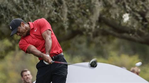 Tiger Woods Triumphs In Long Drive Competition From His Knees