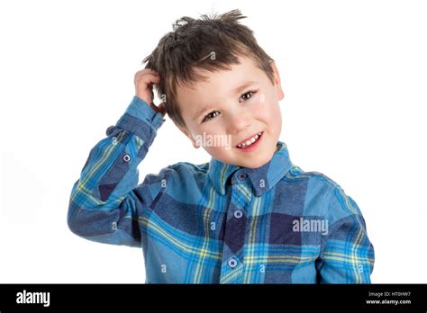 Little Boy Scratching His Head Isolated On A White Background Stock