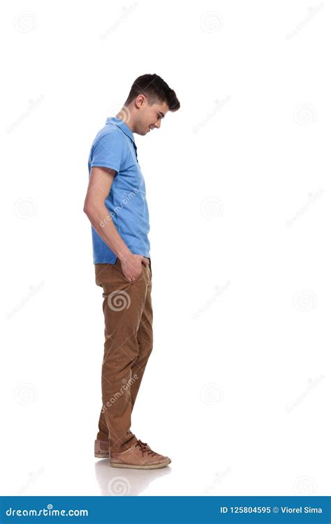 Side View Of A Young Casual Man Looking Down Stock Image Image Of