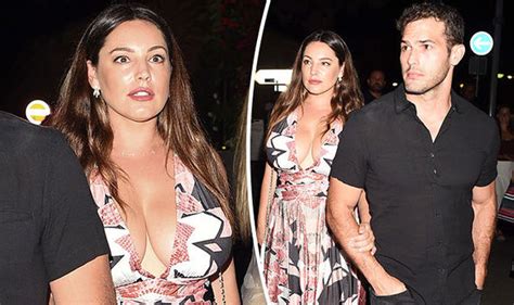 Kelly Brook Oozes Sex Appeal As Enviable Assets Spill Out Of Eye Poppingly Busty Dress