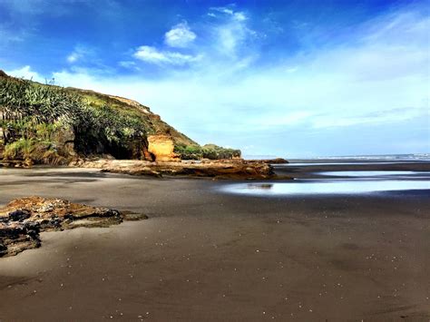 Cliff And Ocean On Karioitahi Black Sand Beach New Zealand Oc