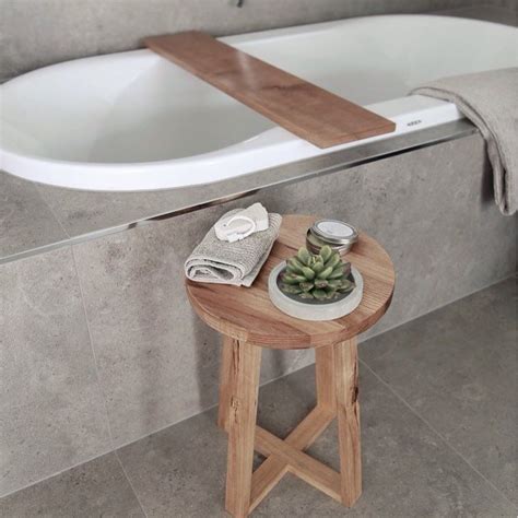 The faux gray stone top complements the table's black frame, making an attractive addition to your furniture set. Combine our Tasmanian Oak Side Table and Bath Caddy and ...