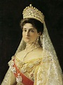 an old photo of a woman wearing a tiara