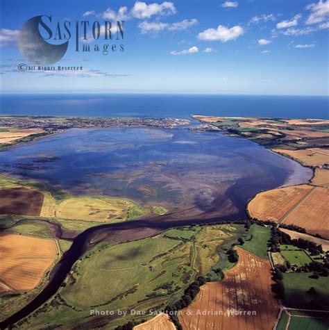 When the geographers use the word lowland they just mean that the land is lowlying, but it does not 2. of Lowlands Scotland