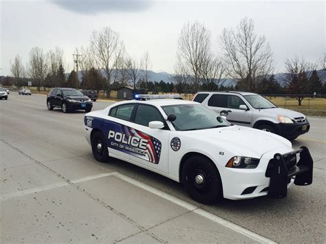missoula police arrest two after finding stolen car passenger had six warrants out for theft