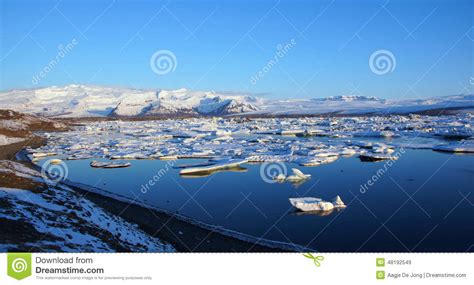 Iceberg Reflection At Sunrise At Jokulsarlon In Iceland Stock Image