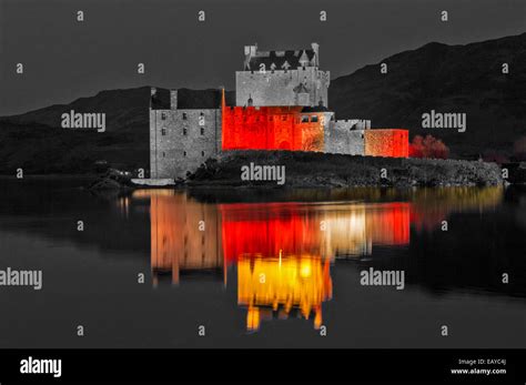 Eilean Donan Castle Dornie Evening Red Lights Reflection On The Sea