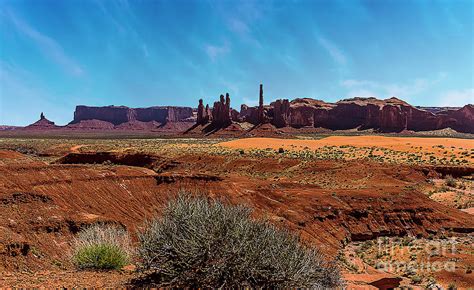 Totem Pole Spire And Yei Bi Chei Spires In Monument Valley Photograph