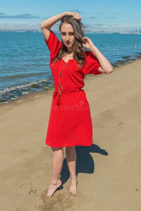 Brunette In Red On A Beach Stock Image Image Of Lovely 153806785