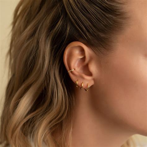 Mini Huggie Hoops Minimalist Ear Piercings Pretty Ear Piercings