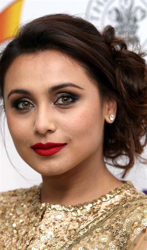 A Close Up Of A Woman With Red Lipstick