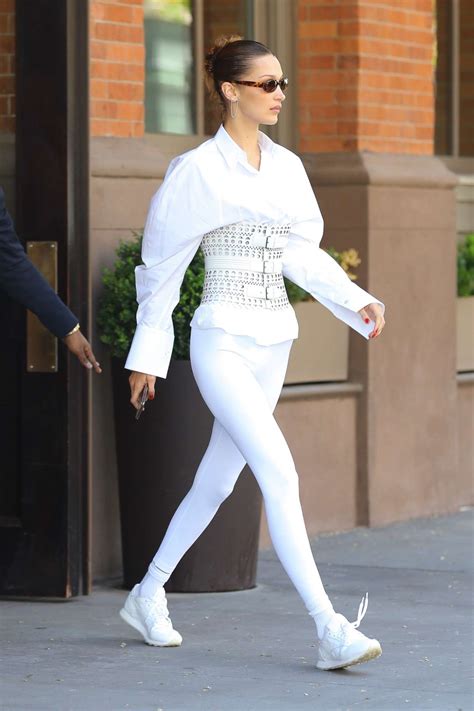The model walked in the mugler fashion show wearing an artsy bodysuit covered in sheer paneling. Bella Hadid White Oversized Jacket Street Style Spring ...