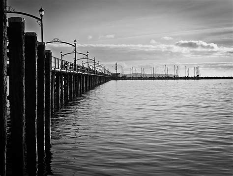 Ocean Pier In Black And White Photograph By Eva
