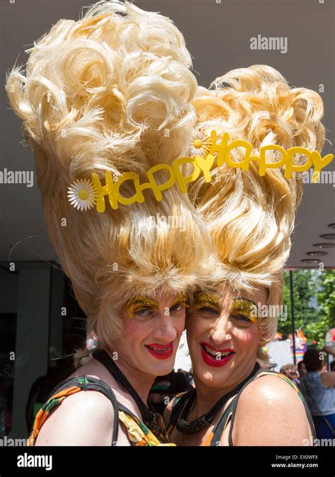 Two Drag Queens With Large Wigs At The Lgbt Pride In London Parade