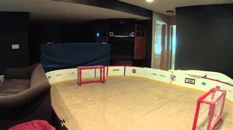 This set comes complete with 2 knee hockey sticks, 2 mini hockey balls, 1 mini goal ,and 10 connectable side board panels to help construct a half rink right in your basement, playroom or wherever you play knee hockey. Knee Hockey Rink - YouTube