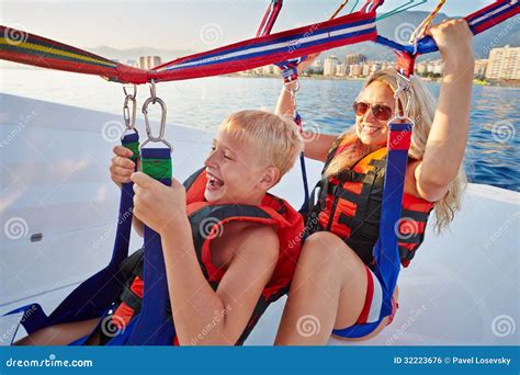 Mother With Her Son In A Motorboat Royalty Free Stock Image CartoonDealer Com