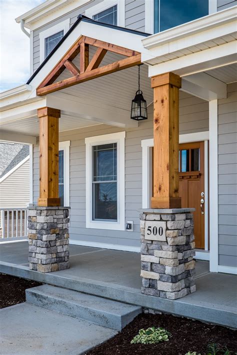 Gorgeous Front Porch With Wood And Stone Columns