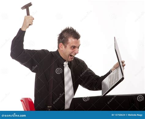 Businessman Destroying Computer Using Keyboard Stock Photography