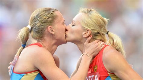 russian athlete denies kiss with relay partner was in protest at anti gay law world news the