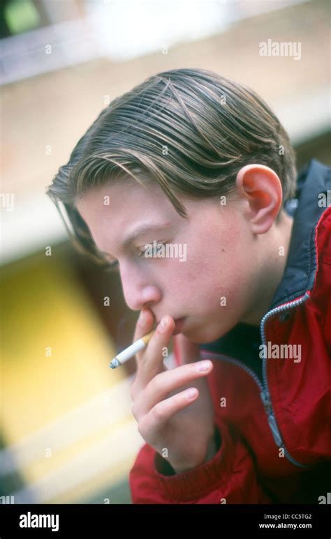 12 Year Old Boy Smoking London Uk Stock Photo Alamy