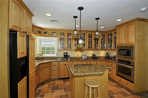 Wood is the best cabinet surface to paint. granite with light wood cabinets - Google Search | Light ...