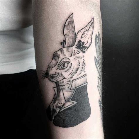 Woodcut rabbit tattoo on the left forearm - Tattoogrid.net