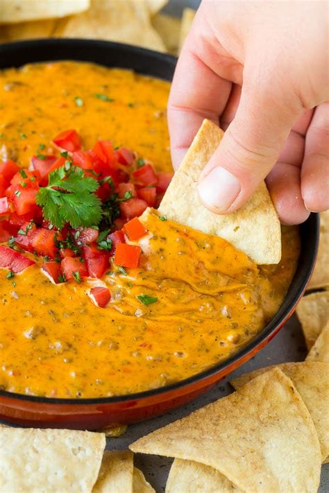 Crock pot queso with beef sausage. Velveeta Cheese Dip Recipe With Hamburger And Rotel ...