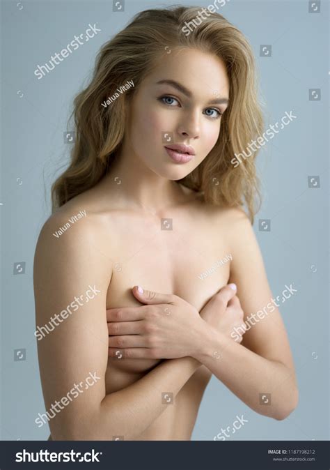 Beautiful Naked Girl Covers Naked Breast Stockfot