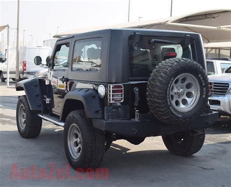 The base wrangler sport gets cloth seats in place of the vinyl ones and leather is now available on the rubicon and sahara. JEEP WRANGLER- 2010- BLACK- GCC SPECS- MANUAL TRANSMISSION...