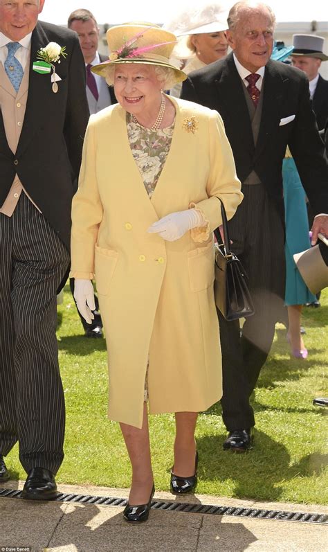 The two day affair, which attracts royalty, celebrities and horse racing aficionados. The Queen wears summery yellow for Epsom Derby as the sun ...