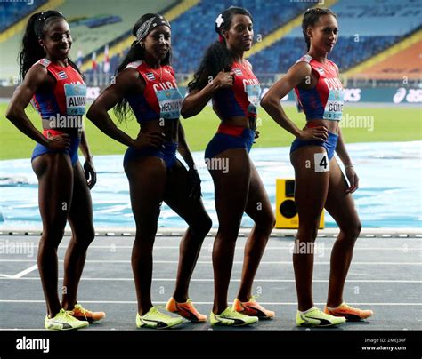 Members Of The Cuban Relay Team Celebrate After Competing In The Women