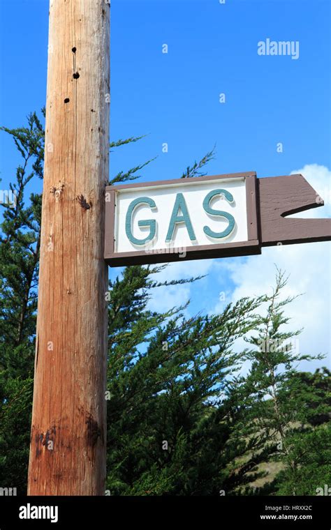 Old Wooden Gas Sign On A Wood Pole At Ragged Point On Famous Highway