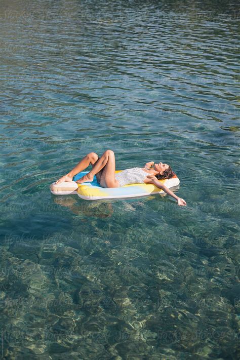 Woman Enjoying The Sea By Stocksy Contributor Mak Stocksy