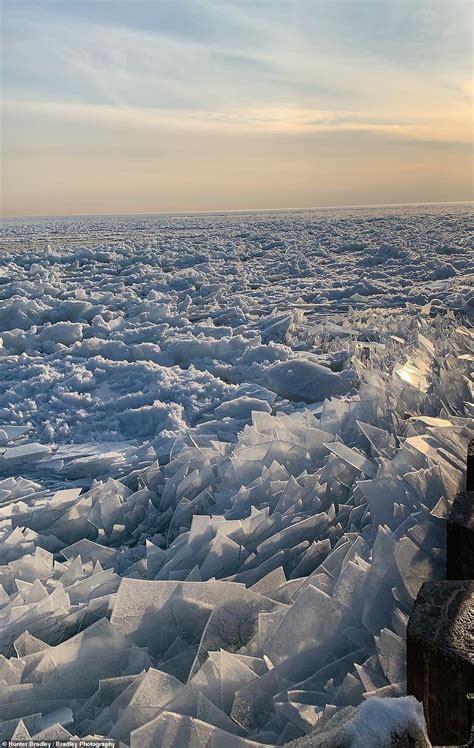 Stunning Images Of Shards Of Ice Littering Lake Michigan Surface As The