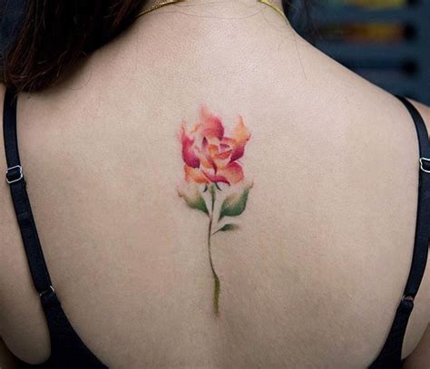 Burning Flower Watercolor Spine Tattoo By Georgiagreynyc Flower