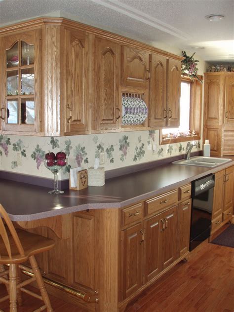 But now, that orangey look is a bit outdated. BACKER'S WOODWORKING: Oak Cabinets