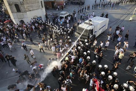Huru Hara Akhir Zaman Riot Police Use A Water Cannon To Disperse Demonstrators During A