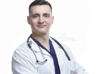 Closeup Portrait Of Professional Confident Male Gp Doctor Posing In