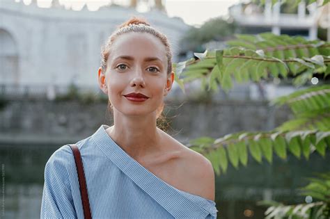 attractive woman looking at camera by stocksy contributor amor burakova stocksy