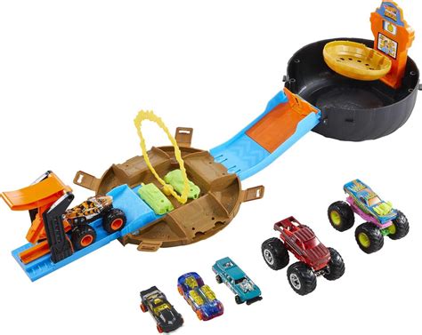 buy hot wheels monster trucks stunt tire playset with 3 toy monster trucks and 4 hot wheels toy