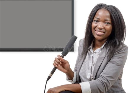 Young African American Journalist With A Microphone Stock Photo Image