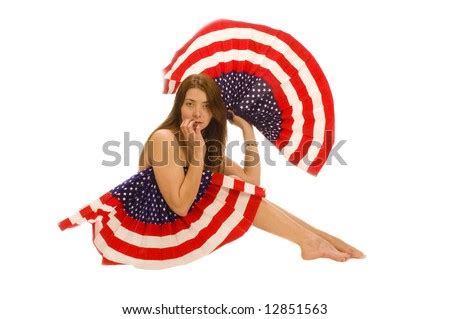Attractive Female American Patriot With Flag Fan Isolated Over White Stock Photo