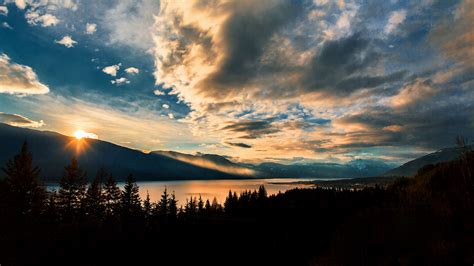 Download Wallpaper 2560x1440 Mountains Lake Sunset Horizon Clouds