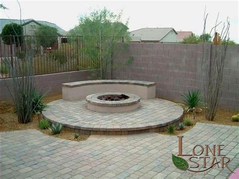 Backyard Patio With Paver Stones Fire Pit And Seating