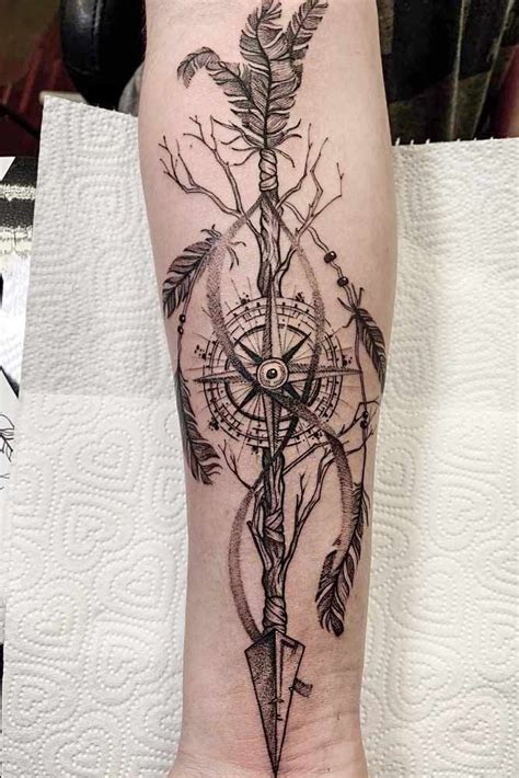 21 Amazing And Unforgettable Arrow Tattoo Designs Arrow Compass Tattoo Arrow Tattoo Design