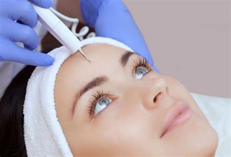 The Cosmetologist Makes The Procedure Treatment Of Couperose Of The