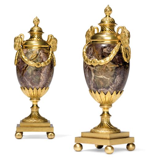 A Pair Of George Iii Ormolu Mounted Blue John Goats Head Candle Vases