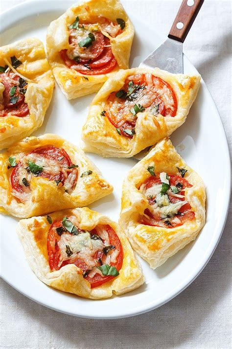 67 holiday appetizers to start christmas dinner off with a bang. Pepperoni Basil Tomato Puffs Recipe — Eatwell101