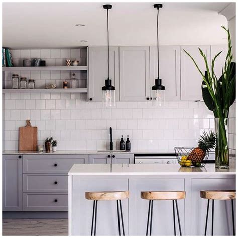 White isn't just a beautiful color choice, it's white also reflects more light than other colors, so kitchens with white cabinetry feel light and never dim. 6 Shades of Gray for a Kitchen That is Anything but Boring