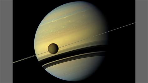 Titan Is Drifting Away From Saturn 100 Times Faster Than We Thought Space